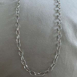 silver chain that hooks on to clothing